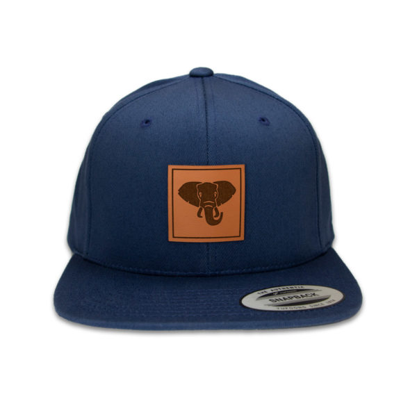 Frontansicht des Produktbildes der blauen LOXODONTA Cap mit Elefanten-Motiv als Echtlederpatch.